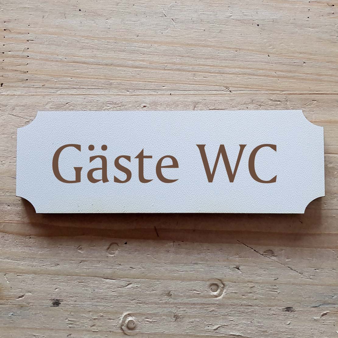 Selbstklebendes Schild « Gäste WC »